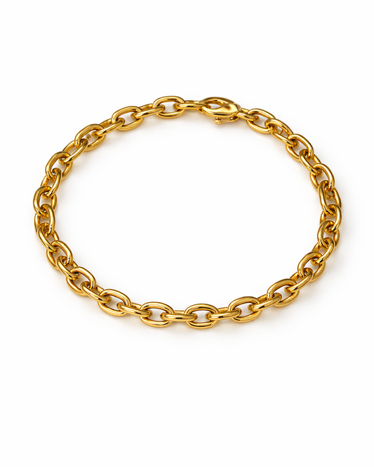 Gold chain bracelet on a white background