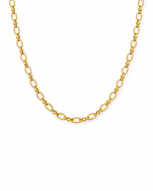 Gold chain necklace on a white background