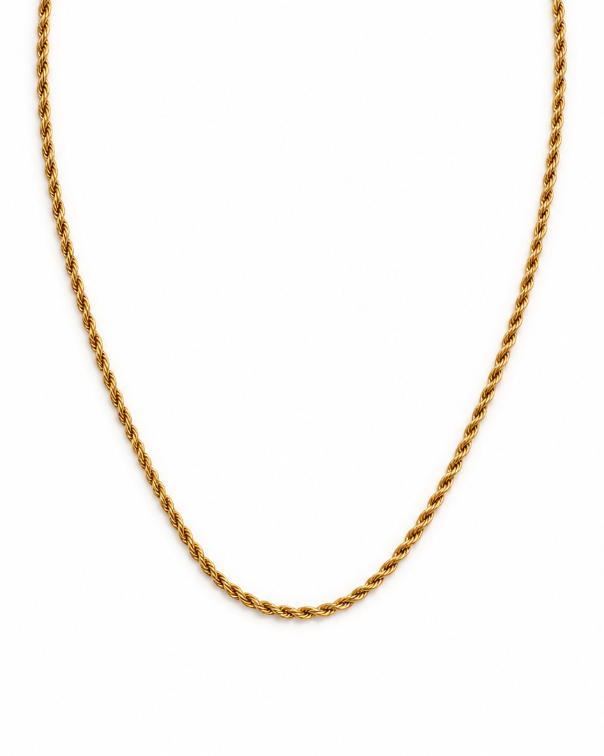 Gold rope chain necklace on a white background