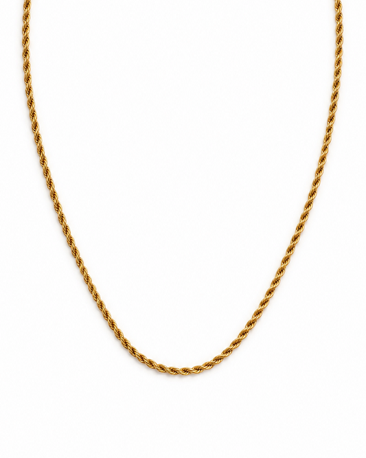 Gold rope chain necklace on a white background