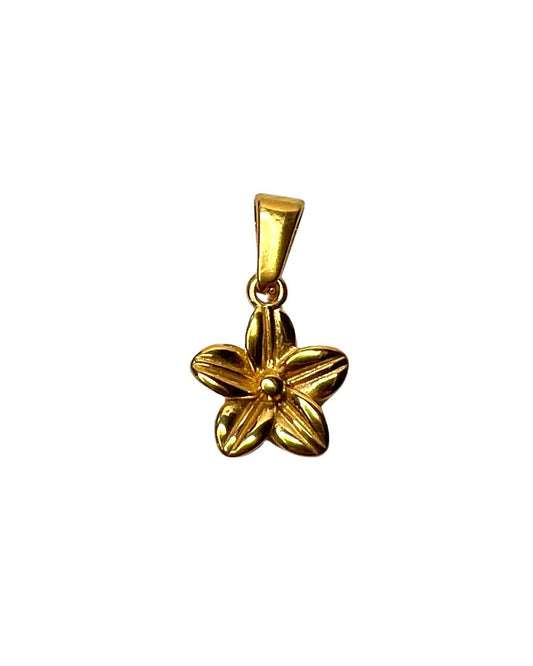 Gold flower-shaped pendant on a white background